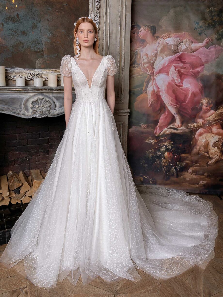 Cap sleeve A-line wedding dress with V-neckline