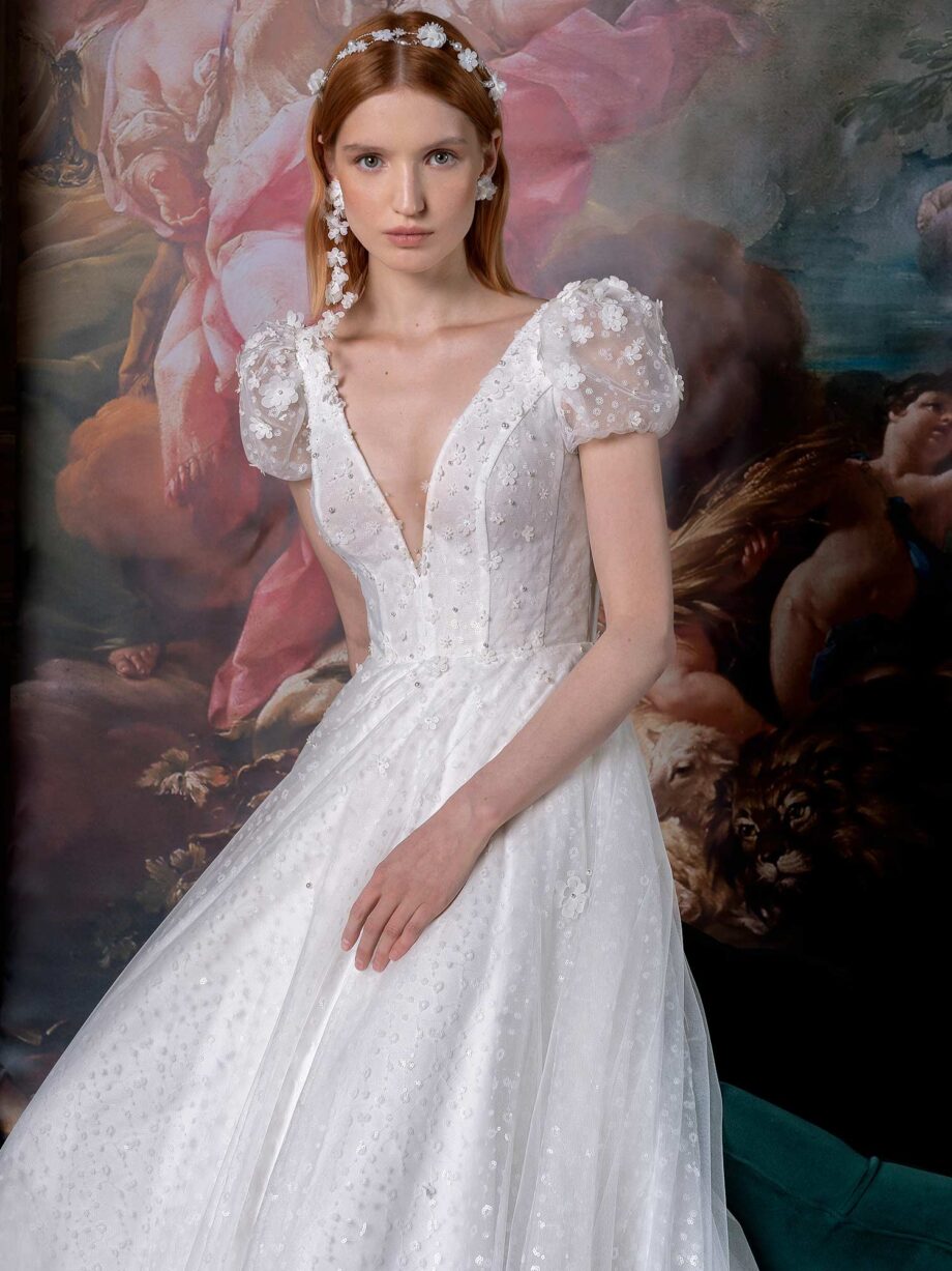 Cap sleeve A-line wedding dress with V-neckline