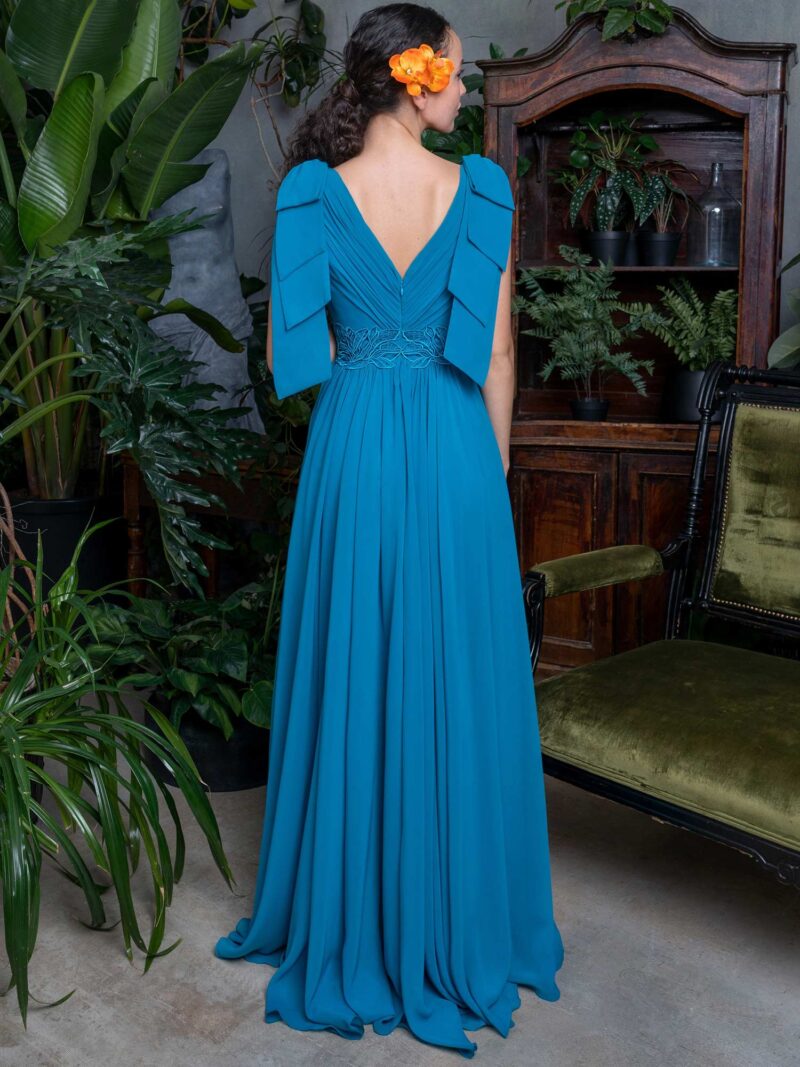 V-neck sheath evening dress with shoulder bow accents