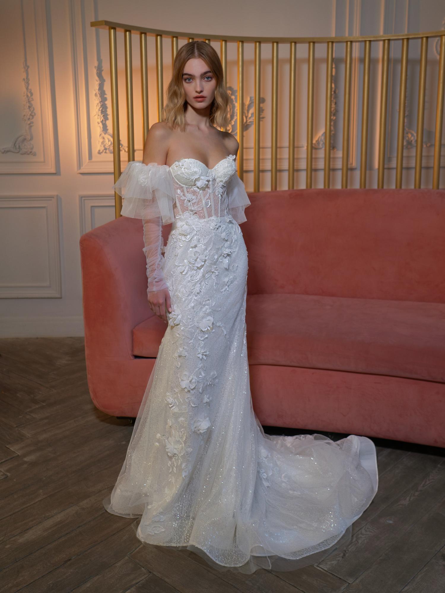 Strapless fit and flare wedding dress with long off-the-shoulder sleeves