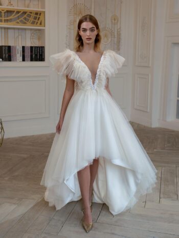 High-low A-line wedding dress with feathers and beads