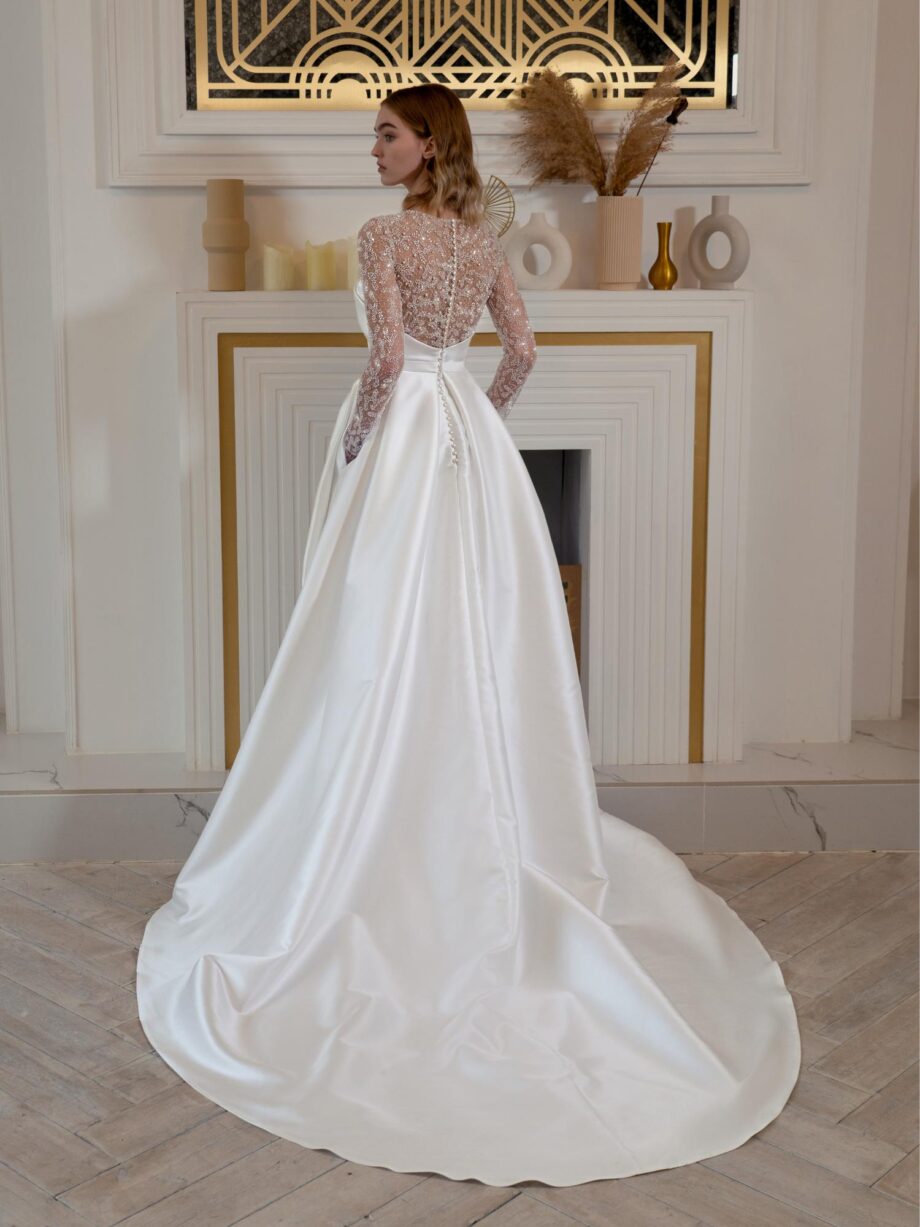 Satin A-line wedding dress with long sparkly sleeves