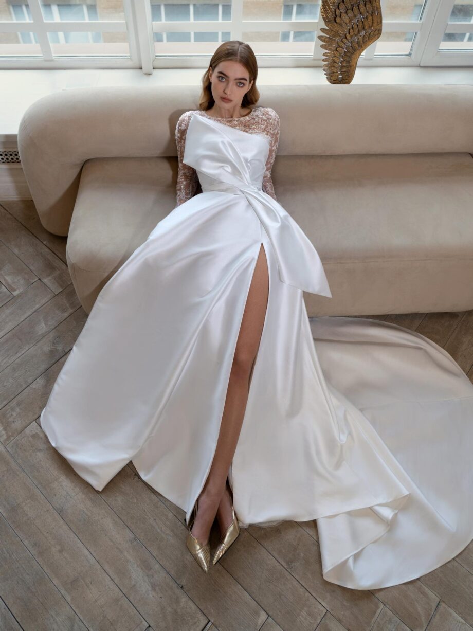 Satin A-line wedding dress with long sparkly sleeves