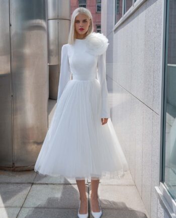 Tea-length wedding dress with long sleeves and a keyhole open back