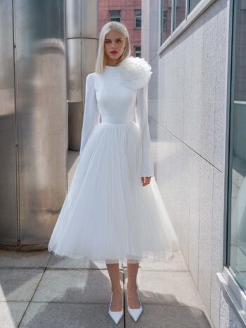 Tea-length wedding dress with long sleeves and a keyhole open back