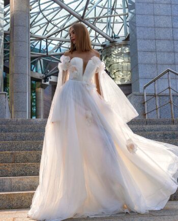 Tulle wedding dress with cape sleeves