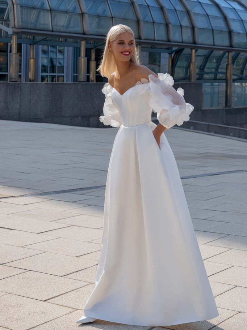 Satin wedding gown with off-the-shoulder baloon sleeves