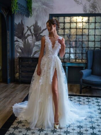 Floral ballgown wedding dress with a slit