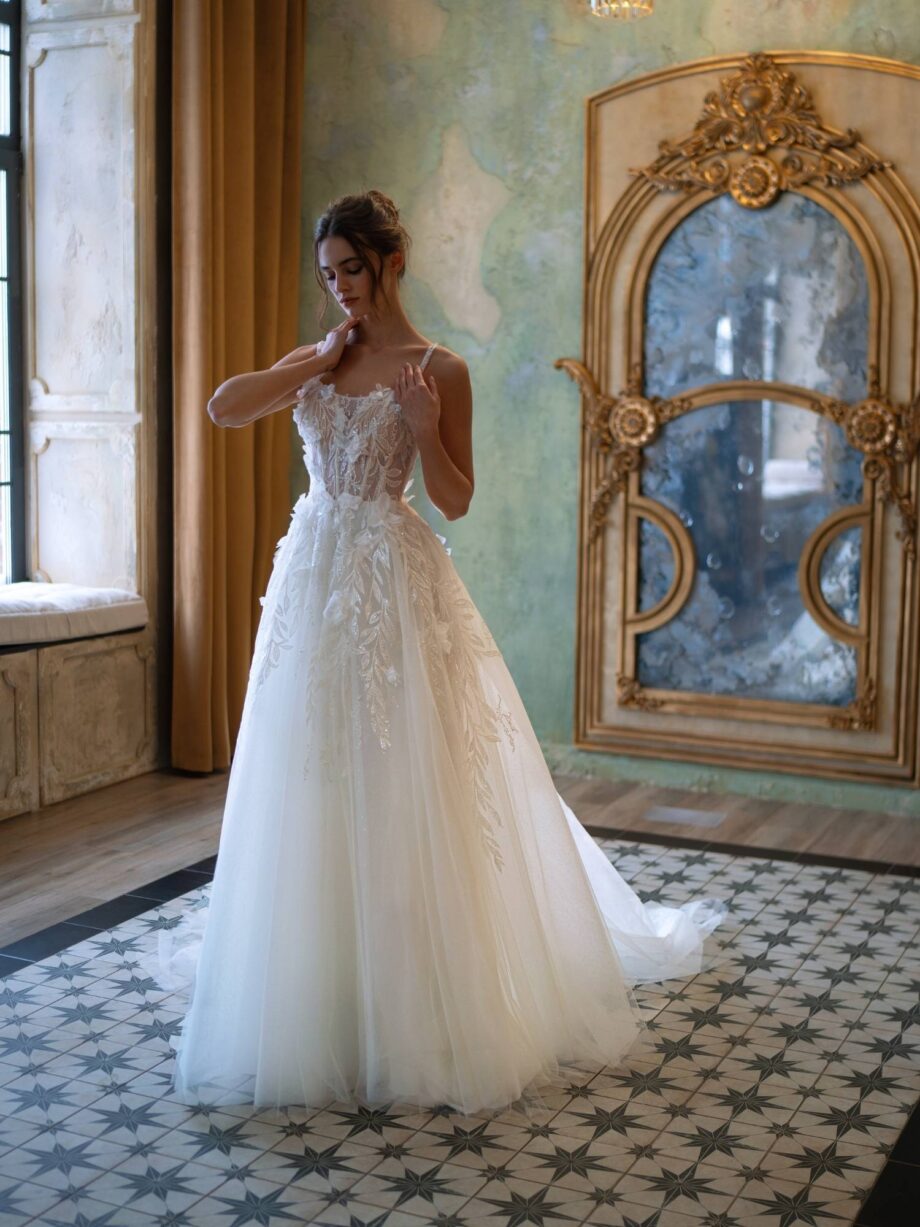 Floral ballgown wedding dress with spaghetti straps