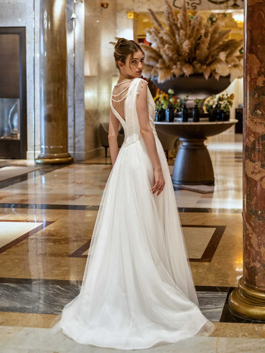 Classic pearl-embellished wedding gown