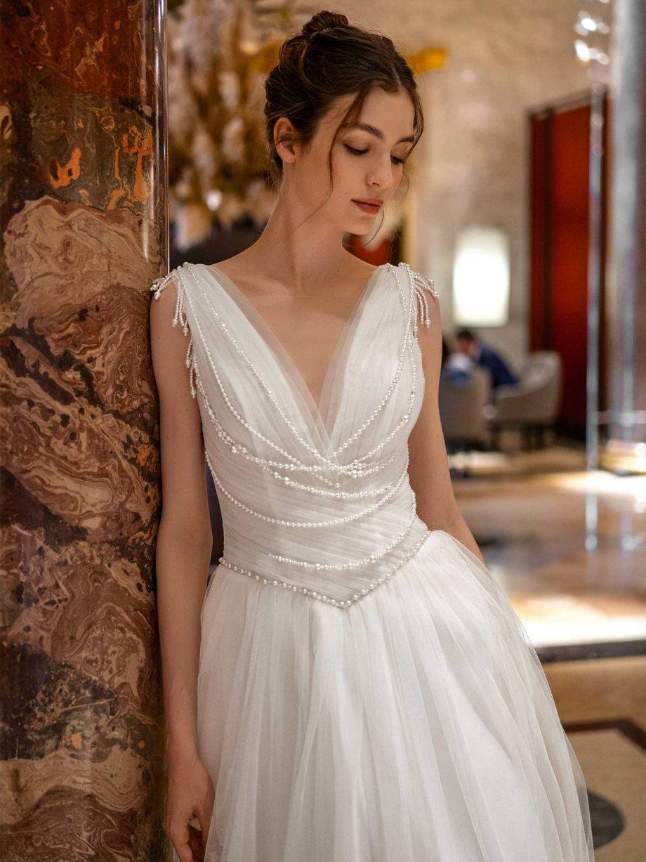 Classic pearl-embellished wedding gown