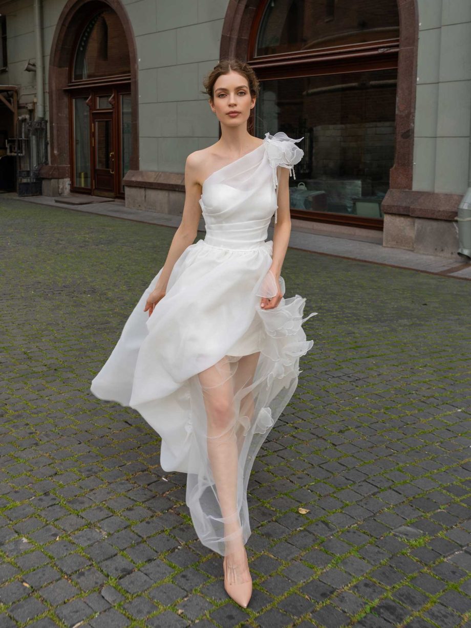 Romantic organza wedding dress with cascading details