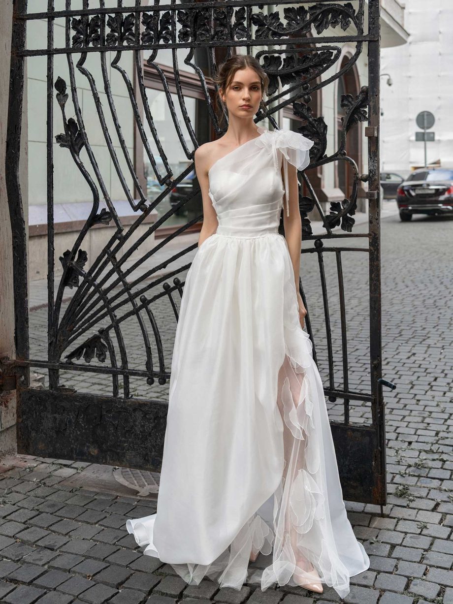 Romantic organza wedding dress with cascading details