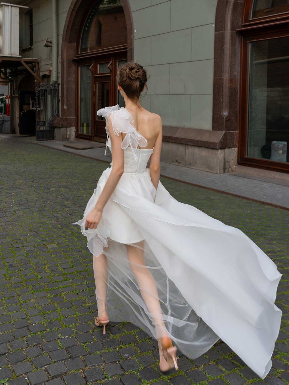 Romantic organza wedding dress with cascading details