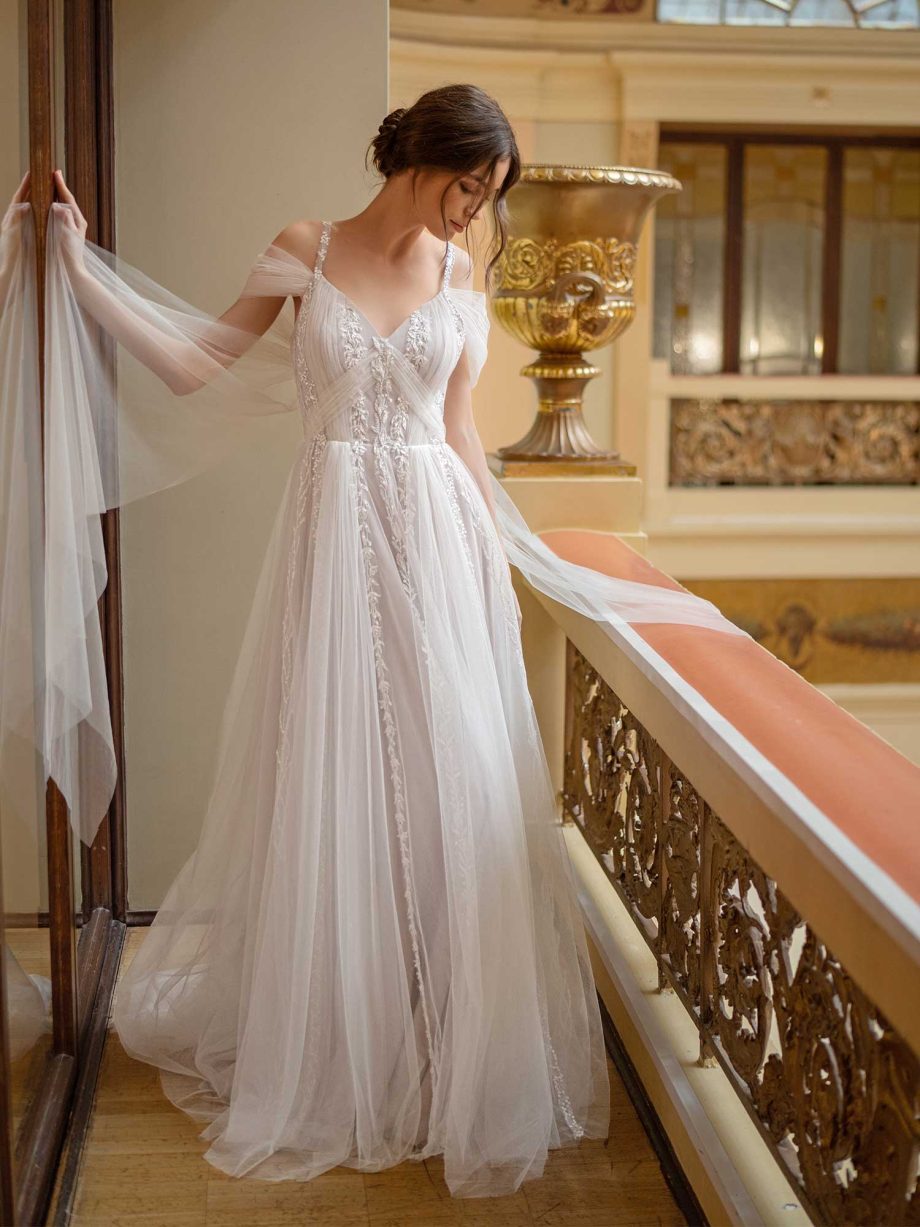 A-line bridal gown with ethereal capes