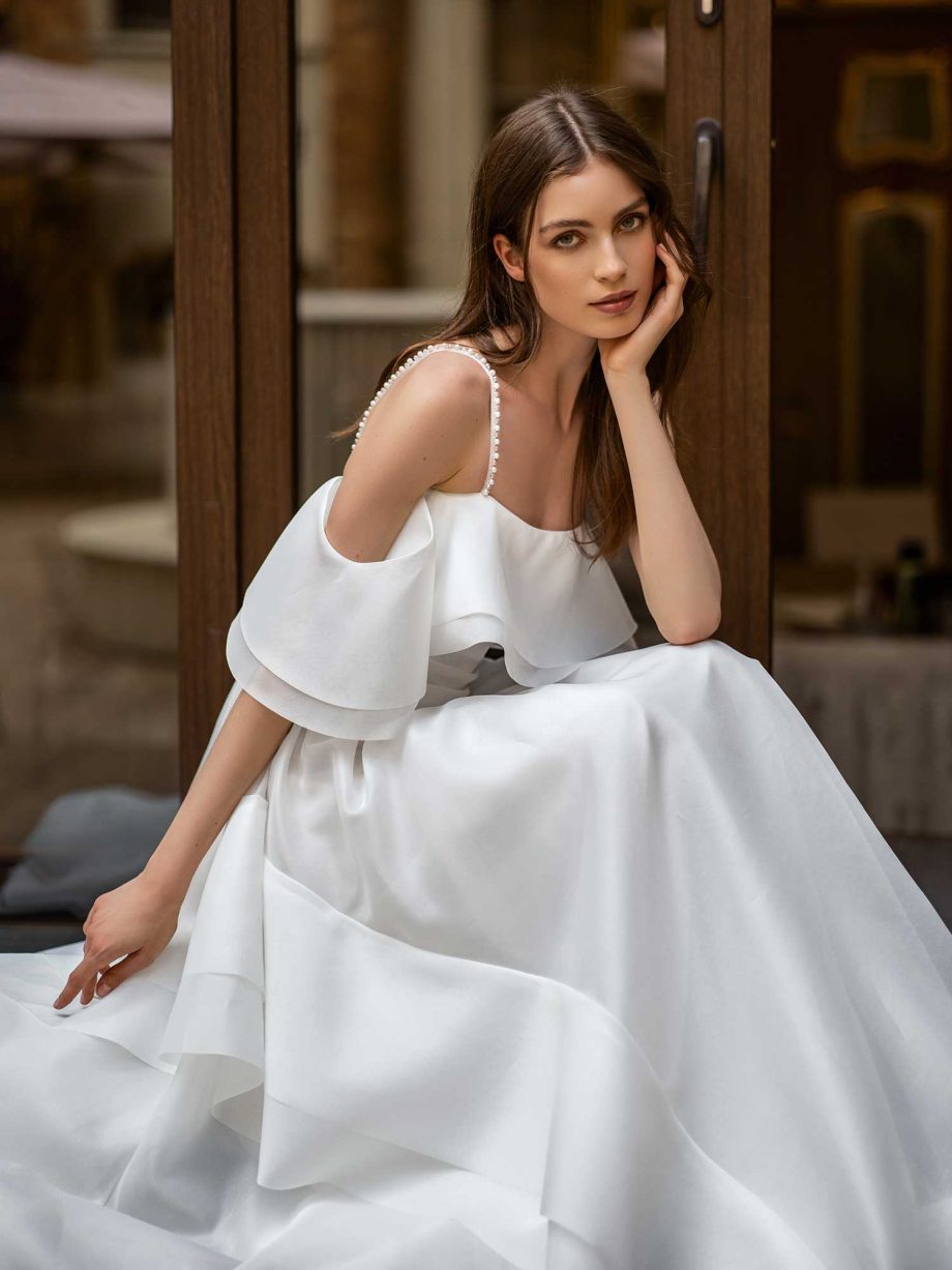 Organza bridal gown with layered off-shoulder detail