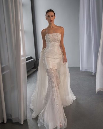 strapless wedding dress with detachable tulle train and fitted underskirt, available at Toronto bridal shop