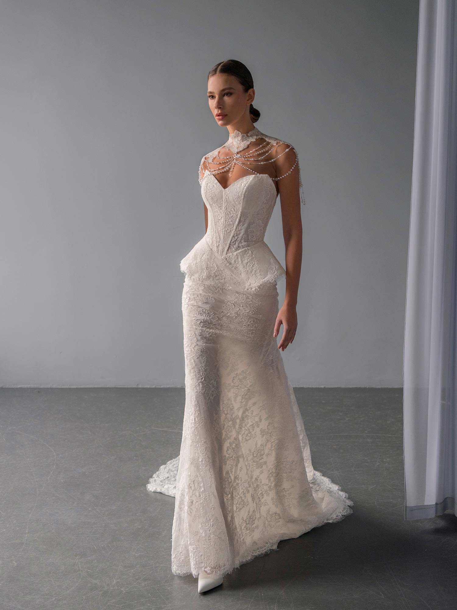lace basque waist fit and flare wedding dress with pearl-draped detachable collar, photographed at Toronto bridal shop