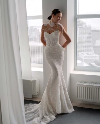 basque waist fit and flare wedding dress with lace and detachable collar, available at Toronto bridal shop Papilio Boutique, bridal stores in Toronto