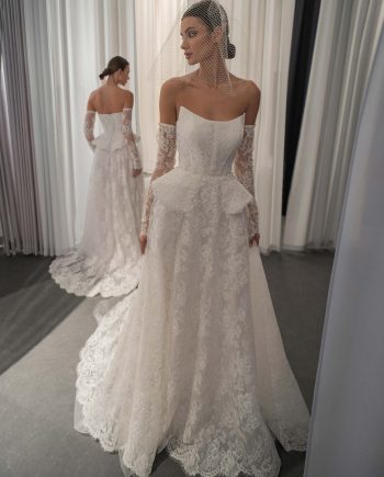 lace A-line wedding dress with basque waist and detachable sleeves, photographed at Papilio Boutique Toronto, bridal stores in Toronto