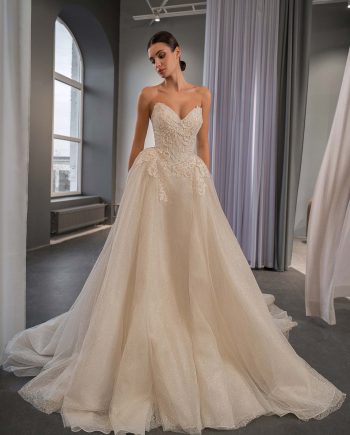shimmering ballgown wedding dress with sweetheart neckline and lace bodice, photographed at Papilio Boutique Toronto, bridal stores in Toronto
