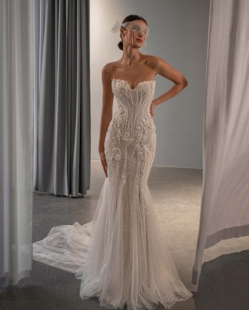 fit and flare wedding dress with basque waist, 3D flowers, beading, and lace-up back by Papilio Boutique bridal store in Toronto