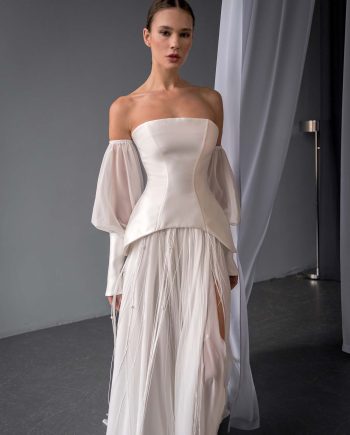 two piece wedding dress with corset top and beaded skirt by Papilio Boutique in Toronto, featuring a mikado corset and chiffon skirt with beaded threads