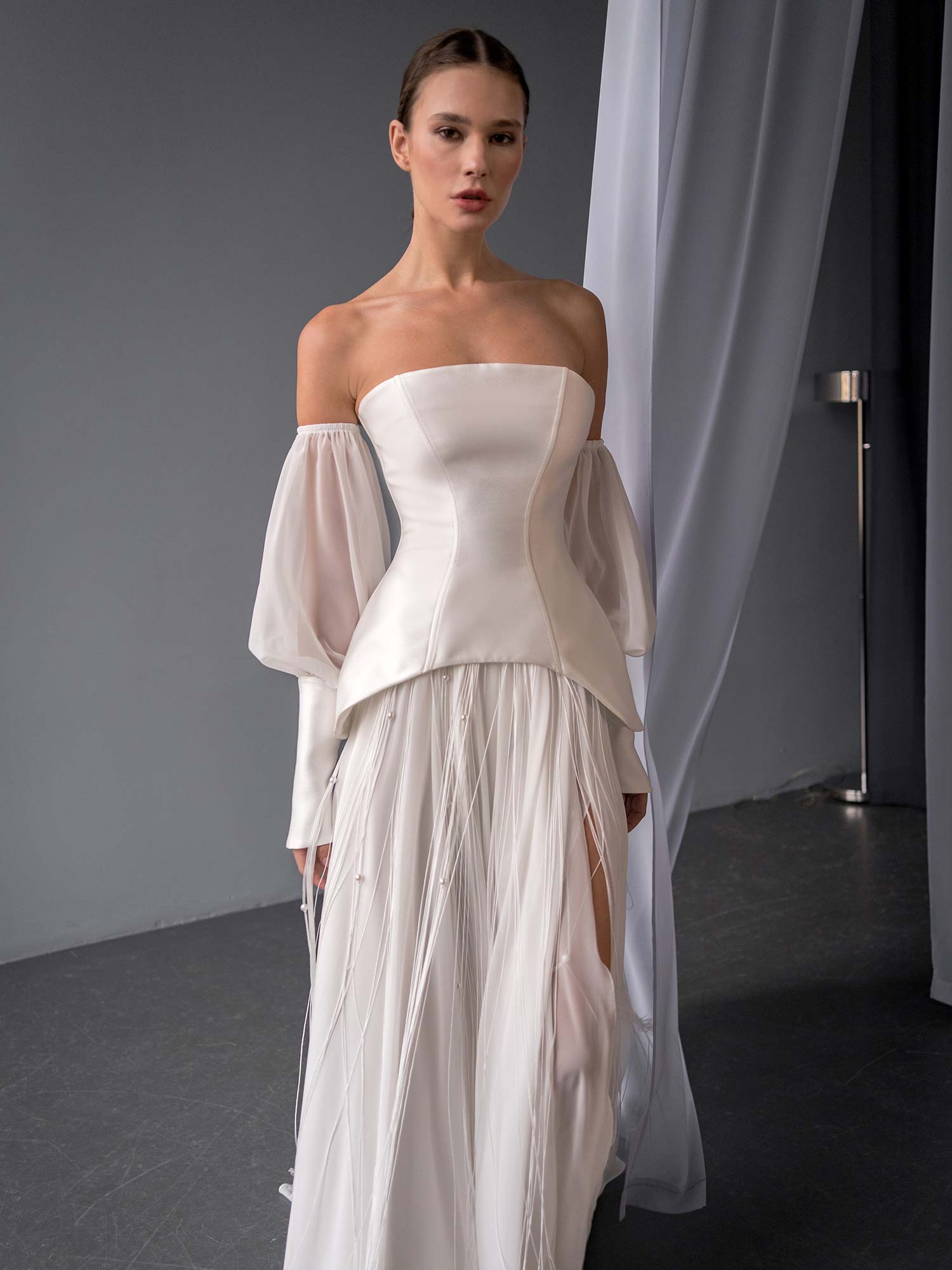 two piece wedding dress with corset top and beaded skirt by Papilio Boutique in Toronto, featuring a mikado corset and chiffon skirt with beaded threads