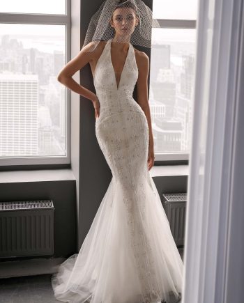 Fully beaded halter neck mermaid wedding dress with vintage lace by Papilio, couture beaded bodice and tulle mermaid skirt — Toronto bridal shop.