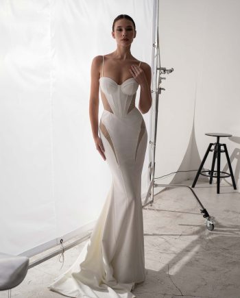 Cut out fit and flare wedding dress with sheer overlay dress by Papilio Boutique, Toronto bridal store.